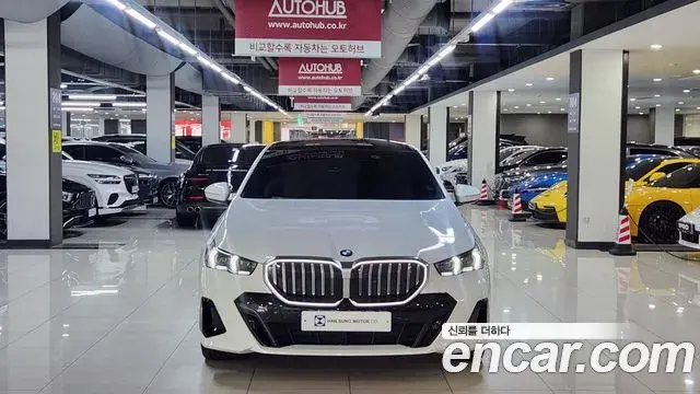 BMW 5 Series 2023 — ფოტო 4/20