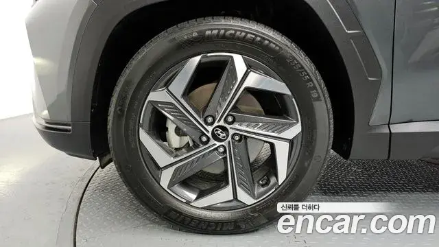 Hyundai Tucson Hybrid 2021 — ფოტო 12/20