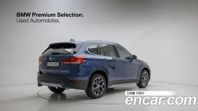 BMW X1 2021 — ფოტო 18/19