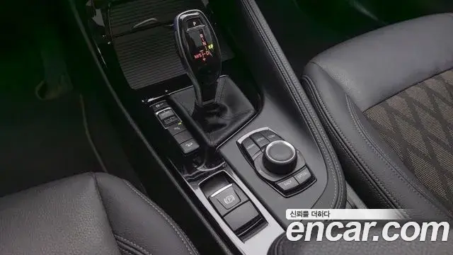BMW X1 2021 — ფოტო 15/19