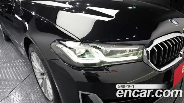 BMW 5 Series 2022 — ფოტო 26/31