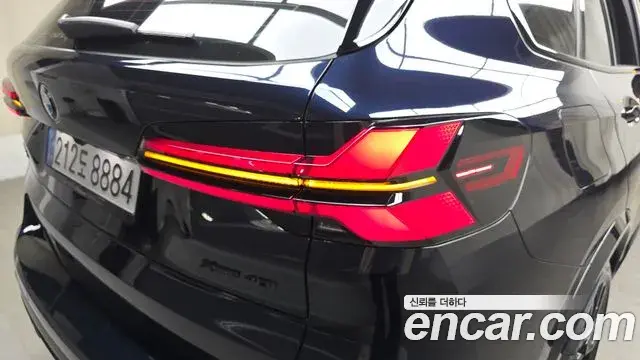 BMW X5 2025 — ფოტო 24/32