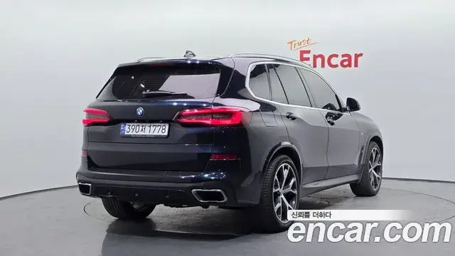 BMW X5 2022 — ფოტო 14/20