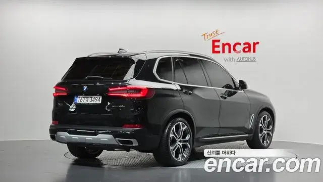 BMW X5 2022 — ფოტო 15/20