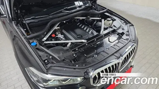 BMW X5 2022 — ფოტო 6/20
