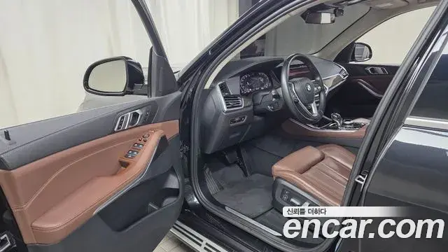 BMW X5 2022 — ფოტო 17/20
