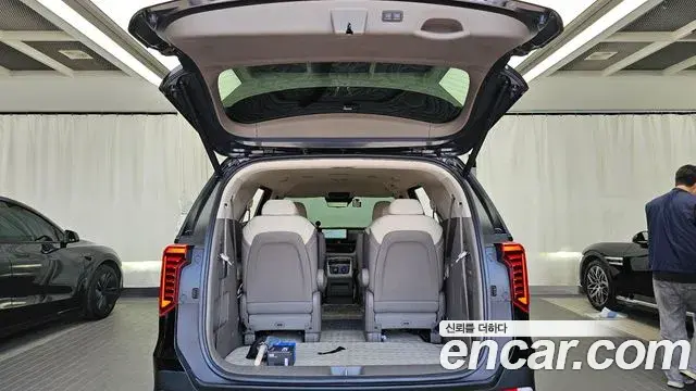 Kia Carnival 2024 — ფოტო 26/35