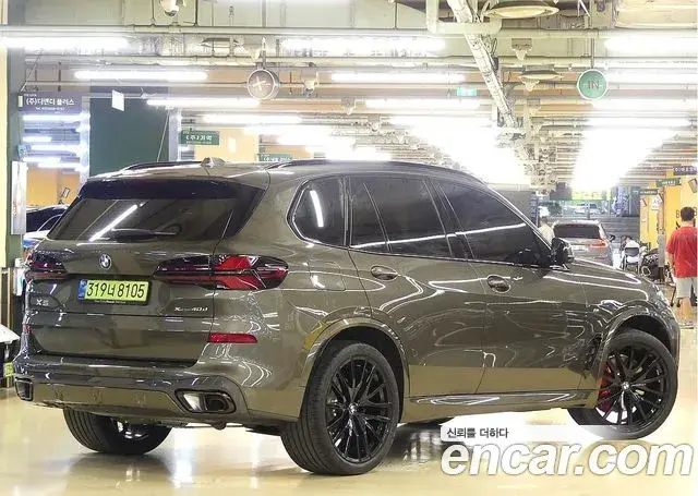 BMW X5 2025 — Фото 1/20