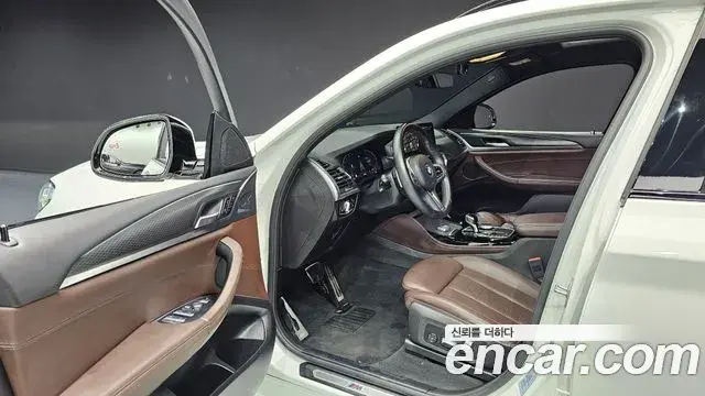 BMW X4 2022 — ფოტო 7/20