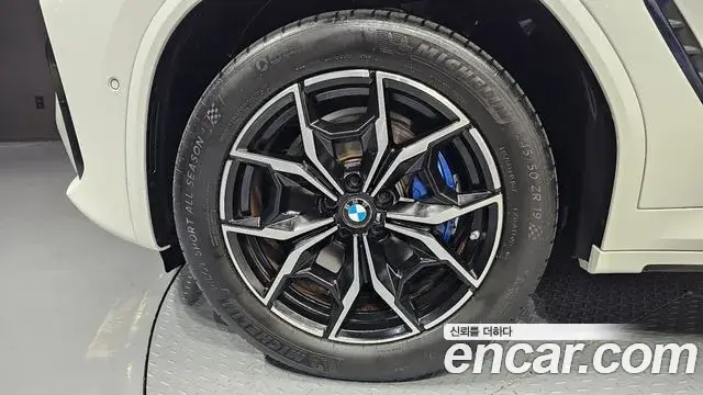 BMW X4 2022 — ფოტო 14/20