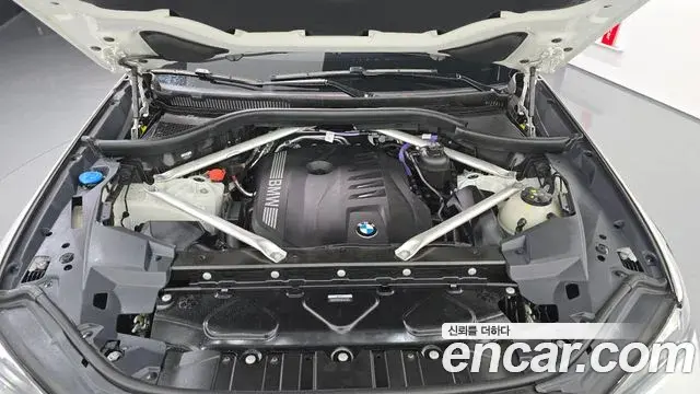 BMW X5 2024 — ფოტო 27/33