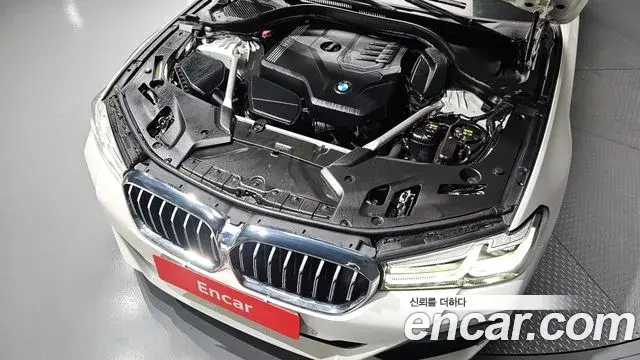 BMW 5 Series 2021 — ფოტო 26/30