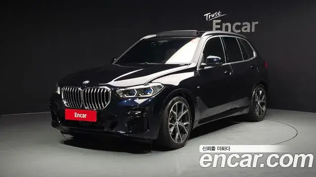 BMW X5 2022 — Фото 1/20