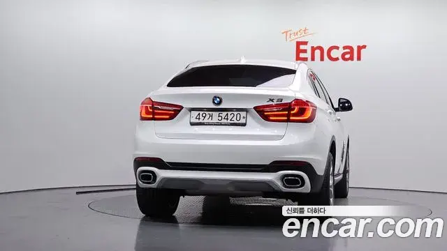 BMW X6 2018 — Şəkil 29/32