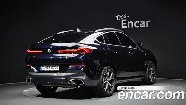 BMW X6 2021 — Фото 2/20