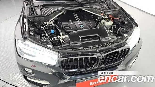 BMW X6 2019 — ფოტო 15/20