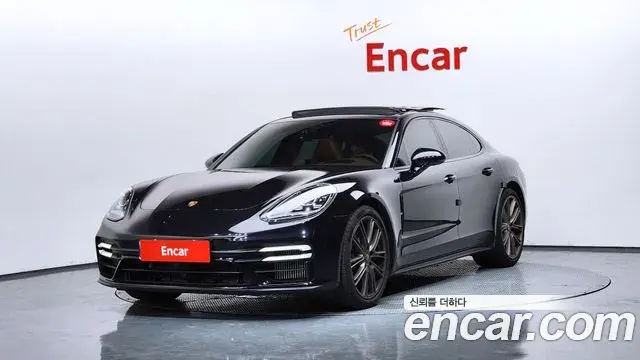 Porsche Panamera 2023 — Фото 1/20