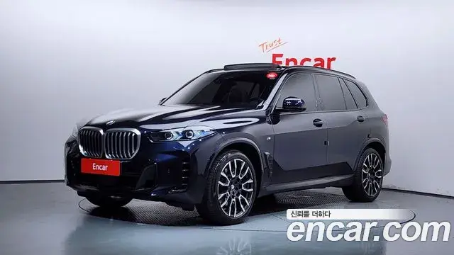 BMW X5 2023 — ფოტო 6/35
