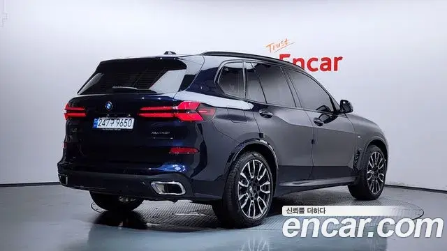 BMW X5 2023 — ფოტო 14/35