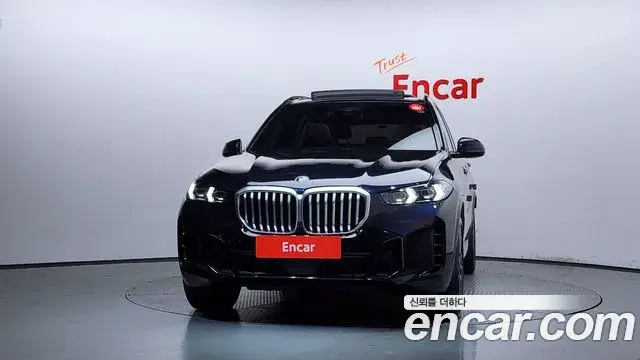 BMW X5 2023 — ფოტო 16/35
