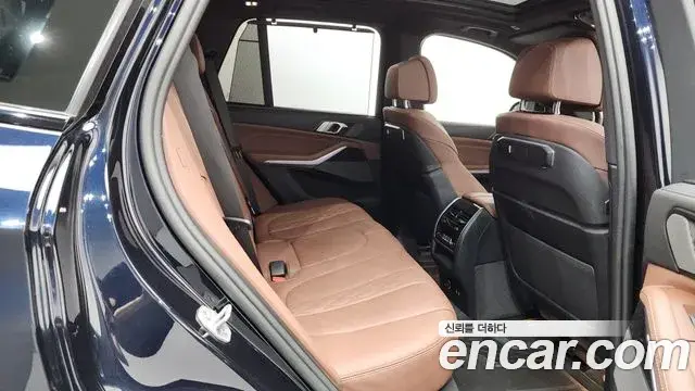 BMW X5 2023 — ფოტო 22/35