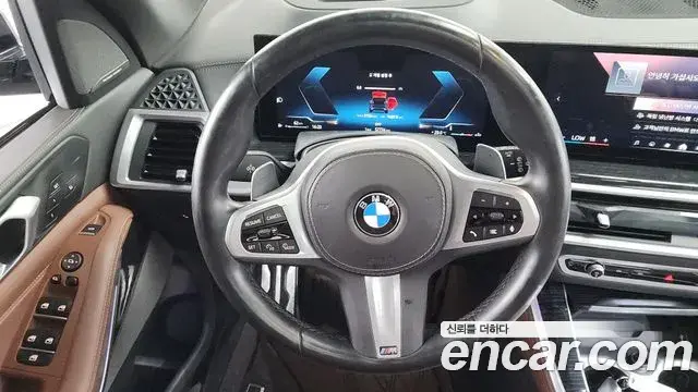 BMW X5 2023 — ფოტო 20/35