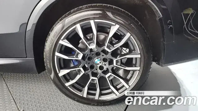 BMW X5 2023 — ფოტო 26/35