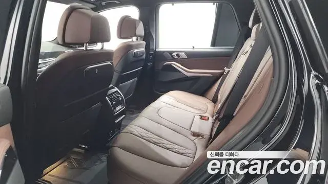 BMW X5 2023 — ფოტო 25/35