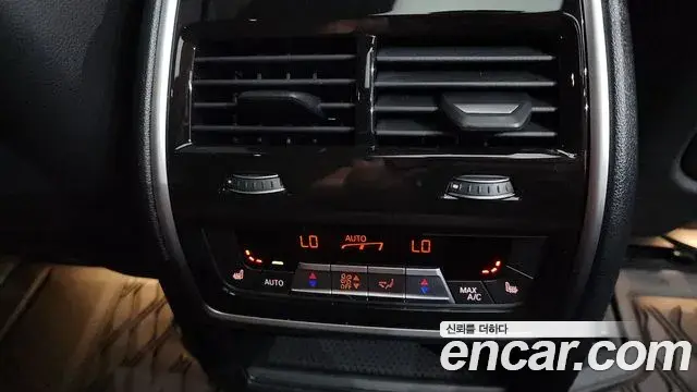 BMW X5 2023 — ფოტო 19/35