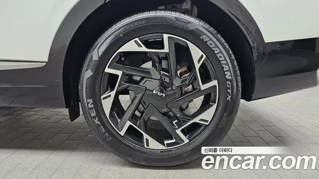 Kia Sportage 2023 — ფოტო 11/31