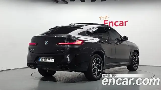 BMW X4 2023 — Фото 2/20