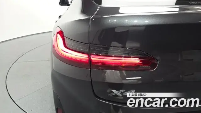 BMW X4 2023 — ფოტო 20/31