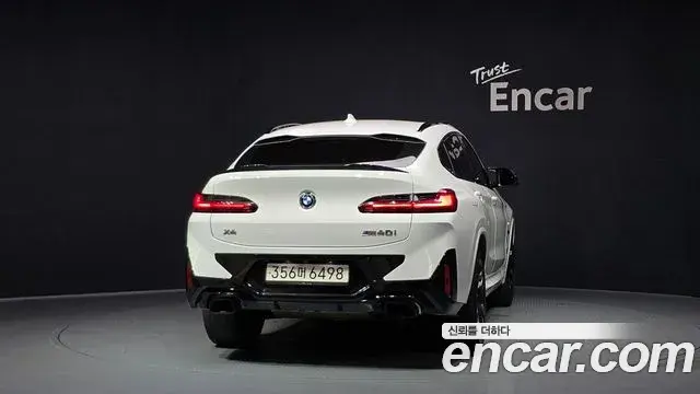 BMW X4 2024 — Фото 4/20