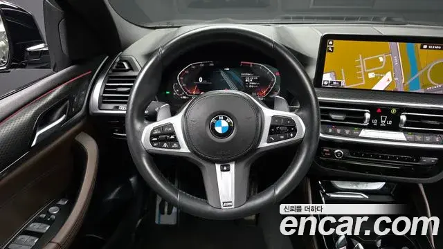 BMW X4 2023 — Photo 25/32