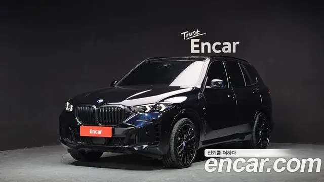 BMW X5 2023 — Фото 1/20