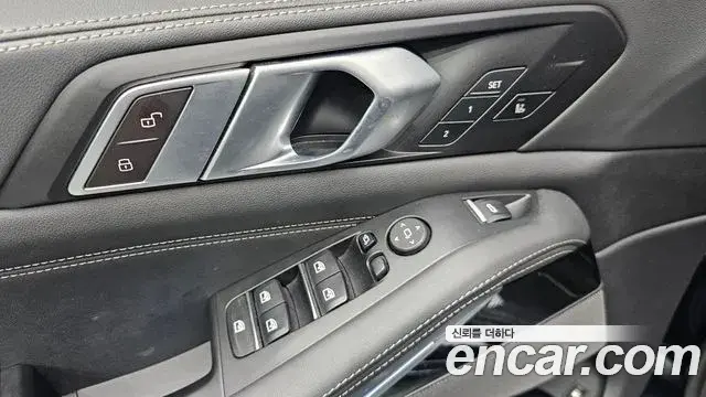 BMW X5 2023 — ფოტო 29/32