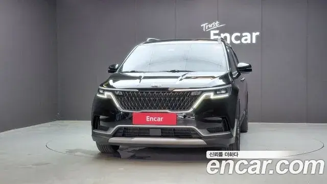 Kia Carnival 2021 — ფოტო 26/34