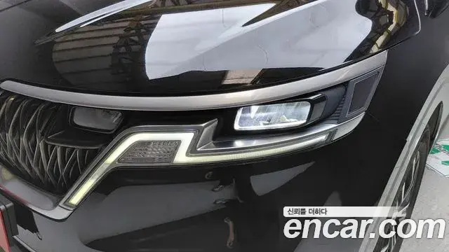 Kia Carnival 2021 — ფოტო 4/34