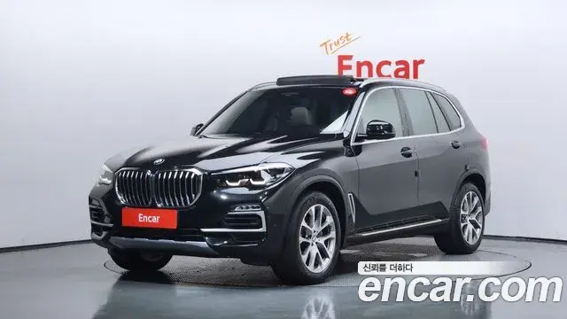 BMW X5 2019 — Фото 1/20