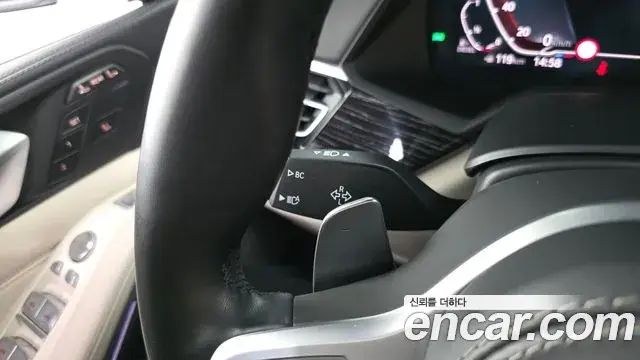 BMW X7 2022 — ფოტო 7/31