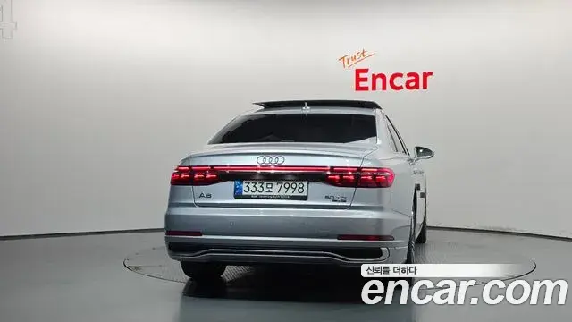 Audi A8 2023 — Фото 4/20