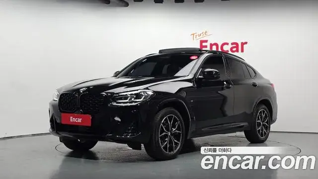 BMW X4 2023 — Фото 1/20