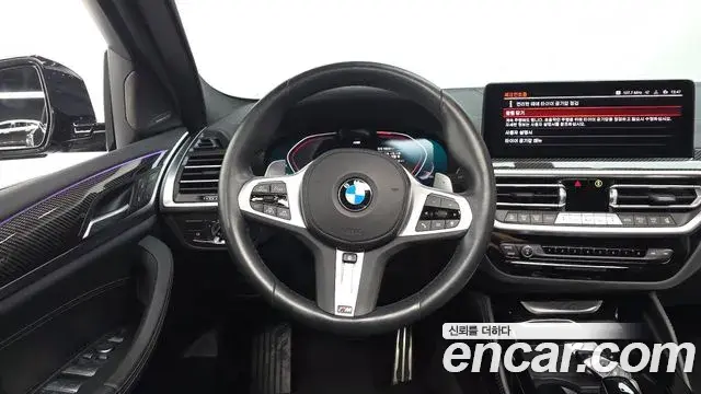 BMW X4 2023 — Фото 12/20