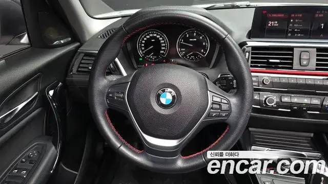 BMW 1 Series 2018 — Фото 13/20