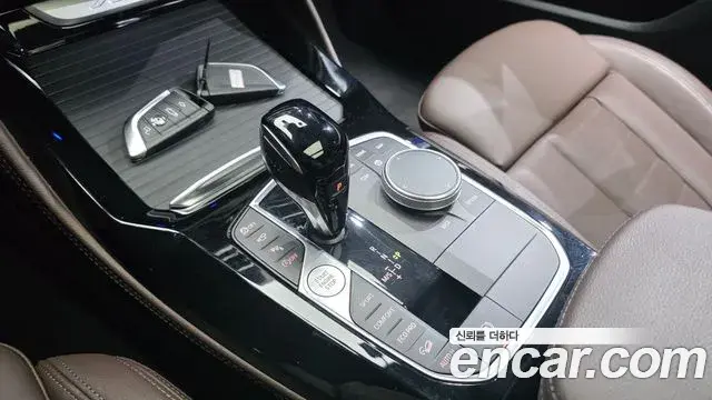 BMW X4 2023 — Photo 9/20