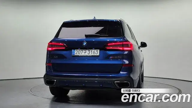 BMW X5 2021 — ფოტო 16/20