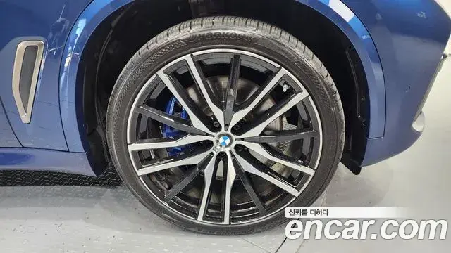 BMW X5 2021 — ფოტო 12/20