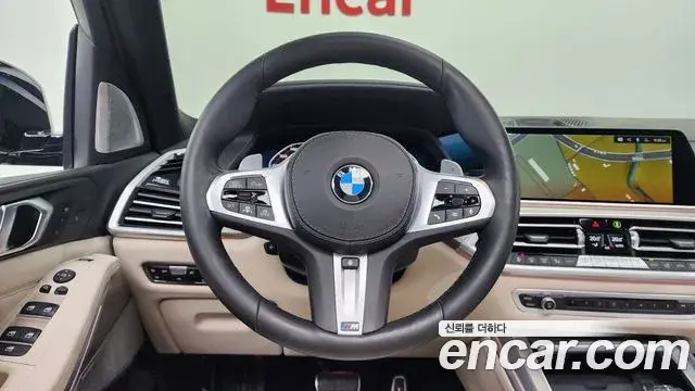 BMW X5 2021 — ფოტო 15/20