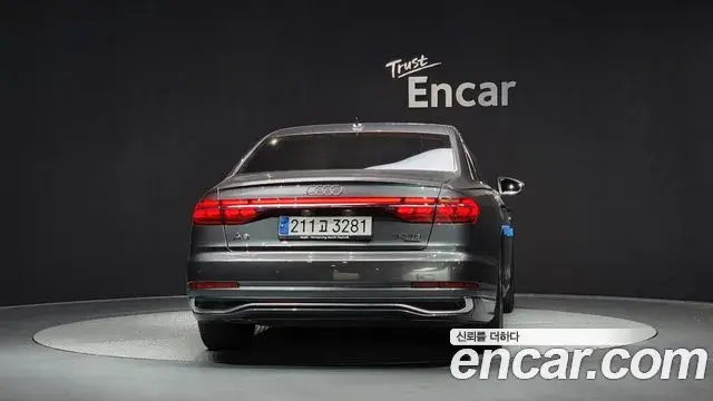 Audi A8 2023 — Фото 4/20