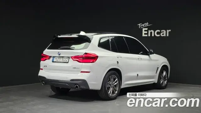 BMW X3 2021 — ფოტო 16/20